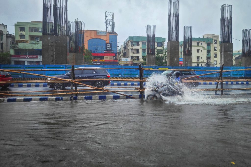 Flooded Tracks in Palghar: Commuters Struggle Amid Heavy Rain